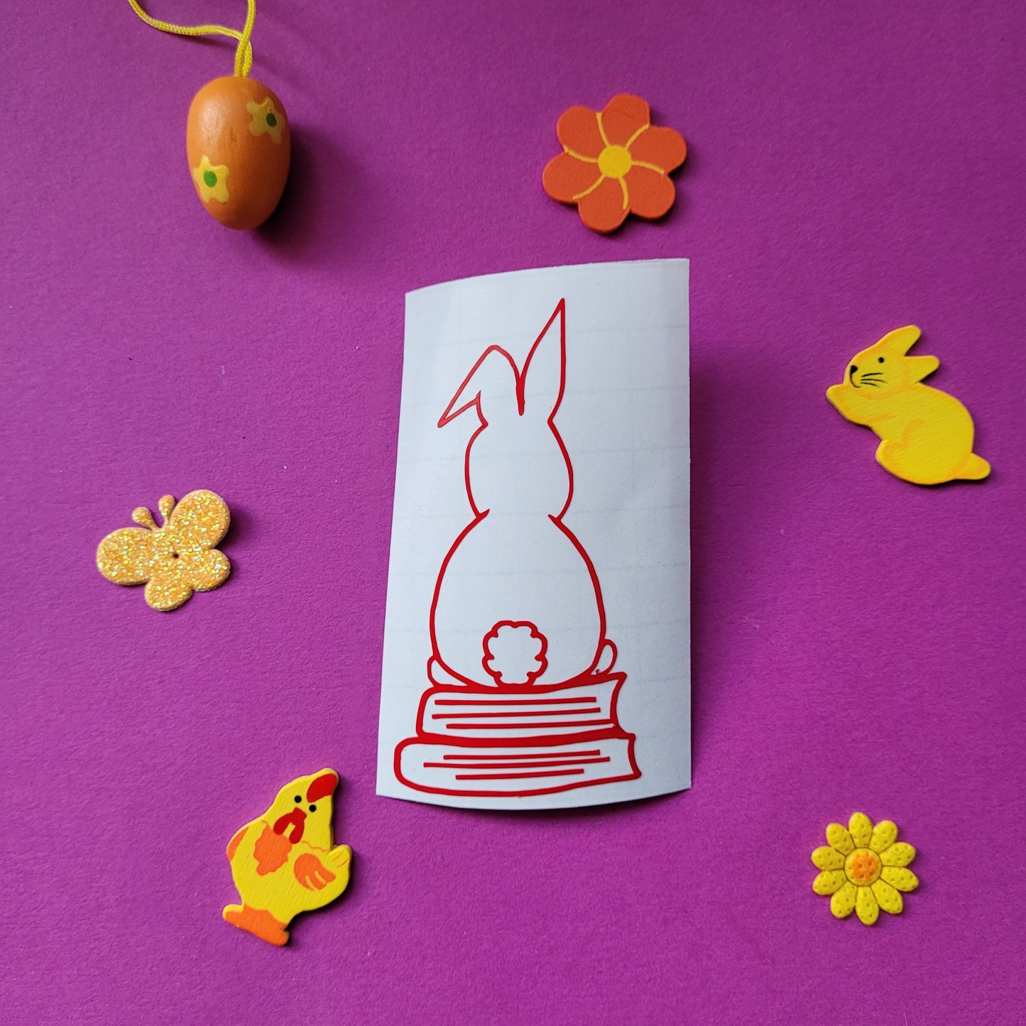Vinyl-Aufkleber "Hase auf Büchern"