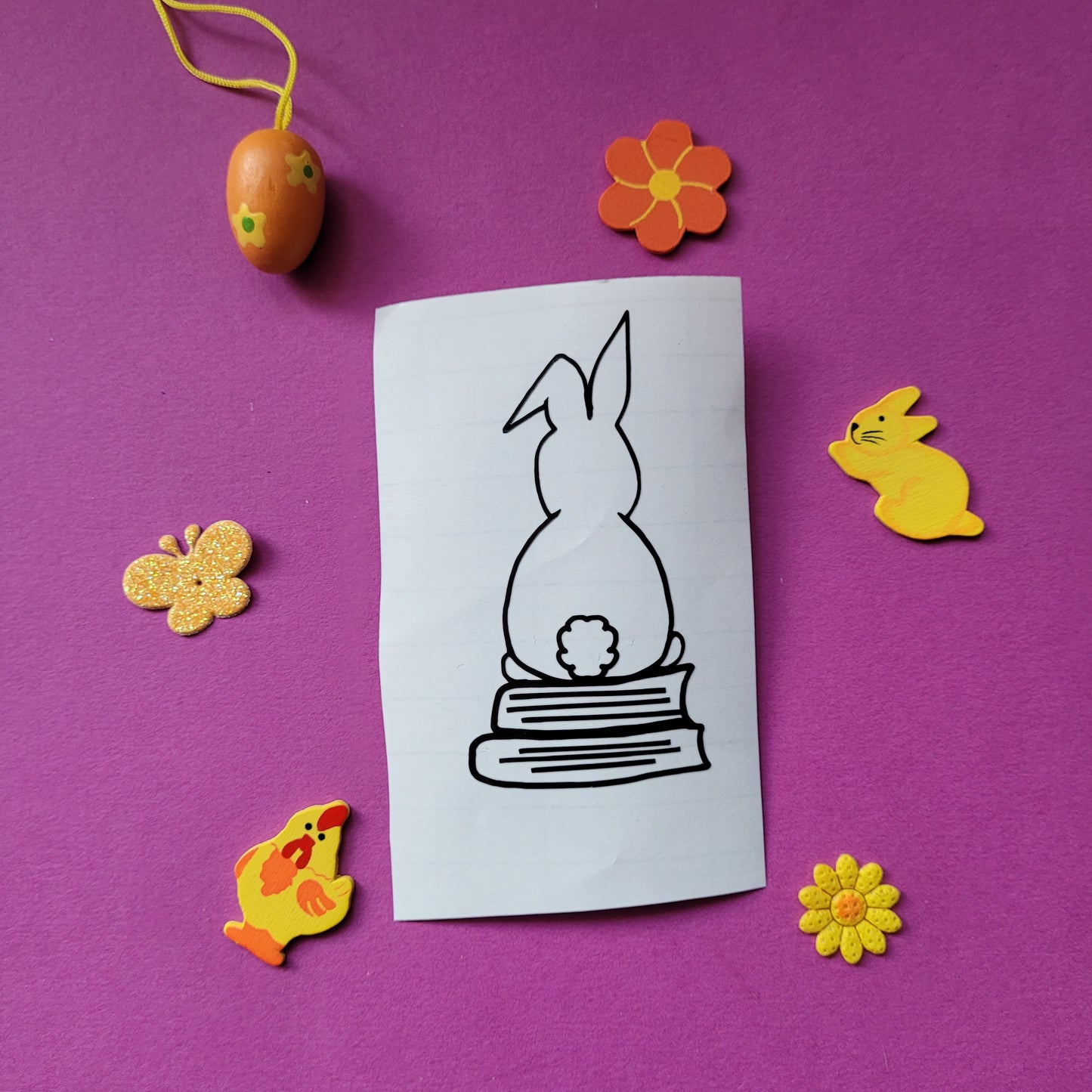 Vinyl-Aufkleber "Hase auf Büchern"