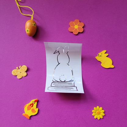 Vinyl-Aufkleber "Hase auf Büchern"