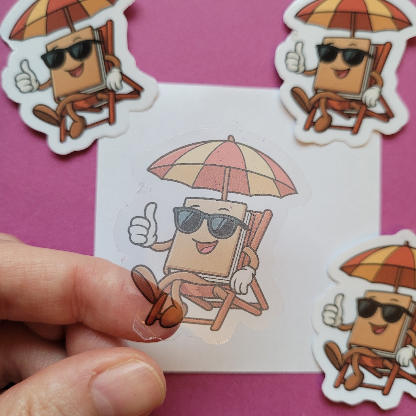 Sticker Buch im Liegestuhl klein transparent