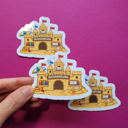 Sticker „Buchhandlung Sandburg“ - Dein Lieblingsbuchladen für den Sommer 🏖️📚🏰✨